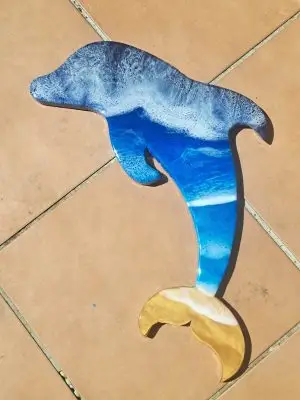 Jumping Dolphin, with crashing Blue surf resin wall art