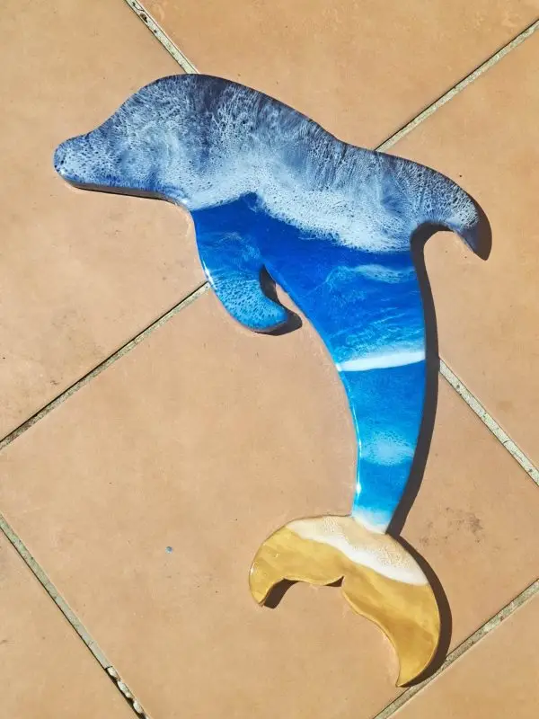 Jumping Dolphin, with crashing Blue surf resin wall art