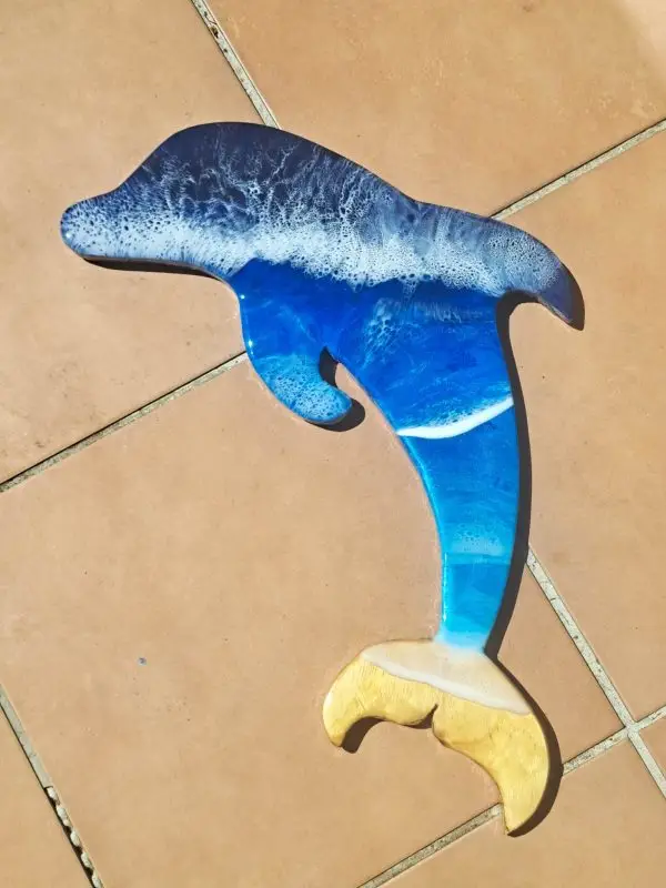 Jumping Dolphin, with crashing Blue surf resin wall art
